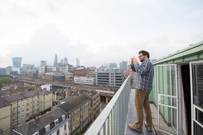 A guest capturing the sprawling cityscape from the rooftop of Wombat's City Hostel London