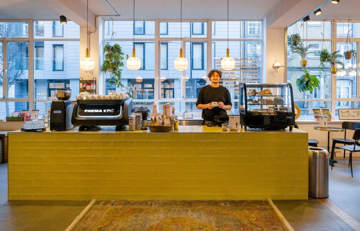 The chic and modern café area of WomCafé in London