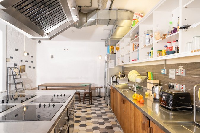 The modern and clean communal kitchen at Wombat's City Hostel London